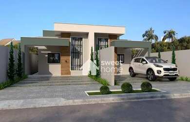 Imagem: A casa possui 3 Dormitórios, 2 Banheiros, 2 Vagas na garagem