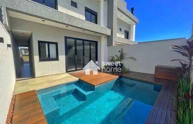 Imagem: A casa possui 3 Dormitórios, 3 Banheiros, 3 Vagas na garagem