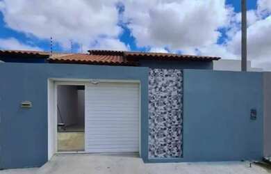 Imagem: A casa possui 3 Dormitórios, 3 Banheiros, 2 Vagas na garagem