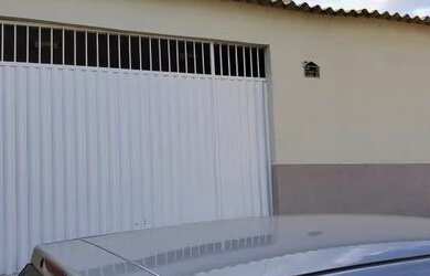 Imagem: A casa possui 2 Dormitórios, 3 Banheiros, 3 Vagas na garagem