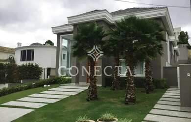 Imagem: A casa possui 5 Dormitórios, 5 Banheiros, 5 Vagas na garagem