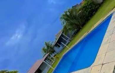 Imagem: A casa possui 4 Dormitórios, 5 Vagas na garagem e está localizado