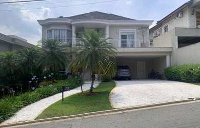 Imagem: A casa em condomínio para alugar possui 4 Dormitórios, 5 Banheiros