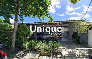 Imagem: A casa possui 3 Dormitórios, 3 Banheiros, 3 Vagas na garagem