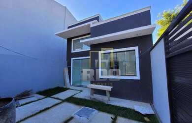 Imagem: A casa possui 2 Dormitórios, 2 Banheiros, 3 Vagas na garagem