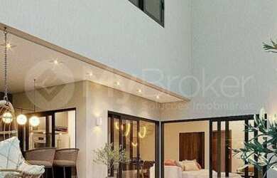 Imagem: A casa possui 4 Dormitórios, 5 Banheiros, 4 Vagas na garagem