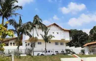 Imagem: A casa possui 5 Dormitórios, 5 Banheiros, 5 Vagas na garagem