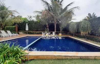 Imagem: A casa em condomínio possui 4 Dormitórios, 5 Banheiros, 4