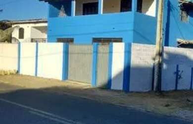 Imagem: A casa possui 4 Dormitórios, 4 Banheiros, 4 Vagas na garagem