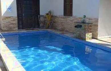 Imagem: A casa possui 4 Dormitórios, 5 Banheiros, 5 Vagas na garagem