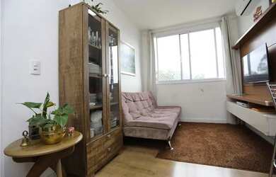 Imagem: O apartamento possui 2 Dormitórios, 1 Banheiro, 1 Vaga na garagem