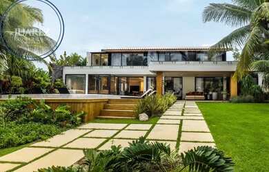 Imagem: A casa possui 5 Dormitórios, 5 Banheiros, 1.000m² de Área