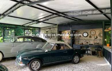 Imagem: A casa em condomínio possui 4 Dormitórios, 5 Banheiros, 5