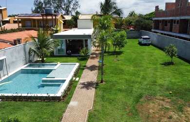 Imagem: A casa em condomínio e possui 2 Dormitórios, Suítes, 2 Banheiros