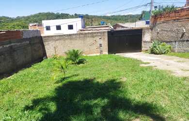 Imagem: A casa possui 2 Dormitórios, 3 Banheiros, 5 Vagas na garagem