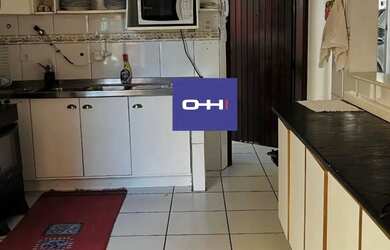 Imagem: A casa possui 5 Dormitórios, 2 Banheiros, 4 Vagas na garagem