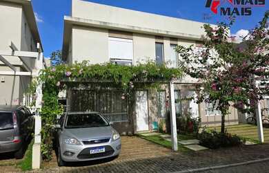 Imagem: A casa possui 2 Dormitórios, 3 Banheiros, 2 Vagas na garagem