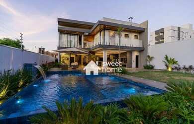 Imagem: A casa possui 3 Dormitórios, 4 Banheiros, 4 Vagas na garagem