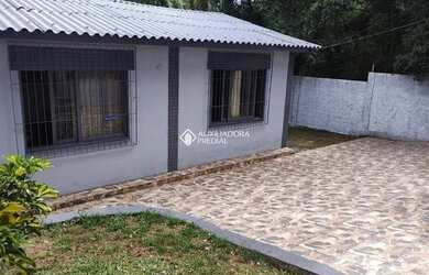 Imagem: A casa possui 3 Dormitórios, 1 Banheiro e 100m² de Área e