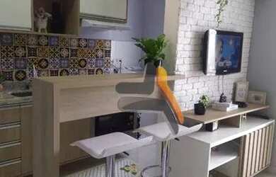 Imagem: O apartamento possui 2 Dormitórios, 1 Banheiro, 1 Vaga na garagem