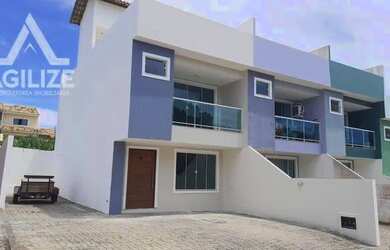 Imagem: A casa possui 3 Dormitórios, 2 Banheiros, 3 Vagas na garagem