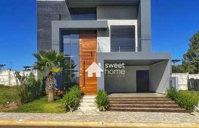 Imagem: A casa em condomínio possui 3 Dormitórios, 4 Banheiros, 2