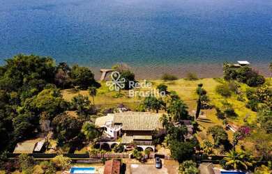 Imagem: A casa possui 5 Dormitórios, 5 Banheiros, 4 Vagas na garagem