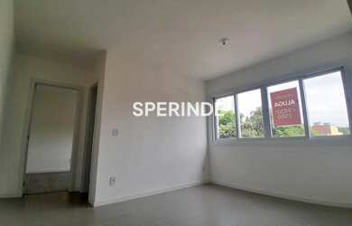 Imagem: O apartamento possui 1 Dormitório, 1 Banheiro, 1 Vaga na garagem