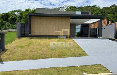 Imagem: A casa possui 3 Dormitórios, 4 Banheiros, 4 Vagas na garagem