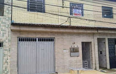 Imagem: A casa possui 2 Dormitórios e 1 Banheiro e está localizado