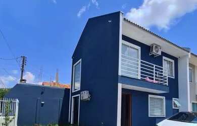 Imagem: A casa possui 3 Dormitórios, 2 Banheiros, 1 Vaga na garagem