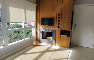 Imagem 2: Apartamento para venda possui 68 metros quadrados com 2 quartos em Auxiliadora - Porto Ale