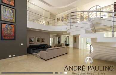 Imagem: A casa em condomínio possui 5 Dormitórios, 4 Banheiros, 619m²