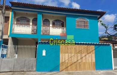 Imagem: A casa possui 5 Dormitórios, 4 Banheiros, 4 Vagas na garagem