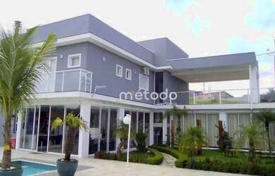 Imagem: A casa em condomínio possui 5 Dormitórios, 5 Banheiros, 5