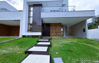 Imagem: A casa em condomínio possui 4 Dormitórios, 5 Banheiros, 2