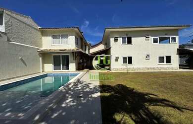 Imagem: A casa possui 4 Dormitórios, 5 Banheiros, 5 Vagas na garagem