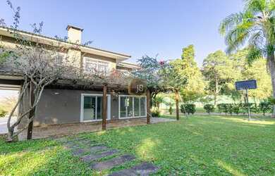 Imagem: A casa em condomínio possui 4 Dormitórios, 5 Banheiros, 5