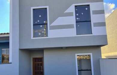 Imagem: A casa possui 3 Dormitórios, 2 Banheiros, 1 Vaga na garagem