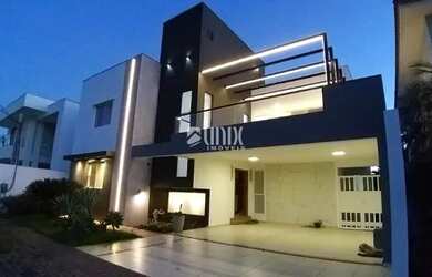 Imagem: A casa possui 5 Dormitórios, 2 Banheiros, 3 Vagas na garagem