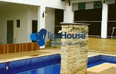 Imagem: A casa em condomínio possui 4 Dormitórios, 5 Banheiros, 4