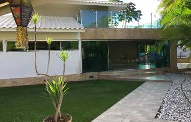 Imagem: A casa possui 3 Dormitórios, 4 Banheiros, 4 Vagas na garagem