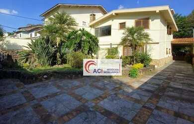 Imagem: A casa em condomínio possui 4 Dormitórios, 4 Banheiros, 5