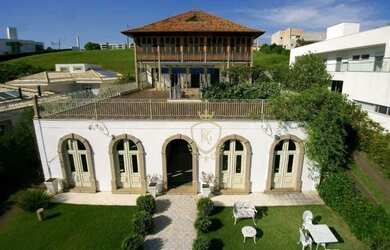 Imagem: A casa em condomínio possui 5 Dormitórios, 5 Banheiros, 4