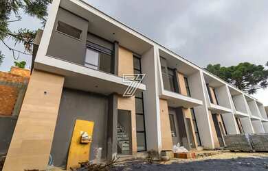 Imagem: A casa em condomínio possui 3 Dormitórios, 3 Banheiros, 114m²