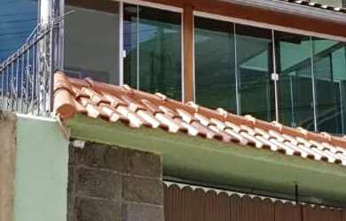 Imagem: A casa possui 3 Dormitórios, 3 Banheiros, 5 Vagas na garagem