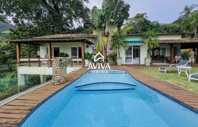 Imagem: A casa em condomínio possui 4 Dormitórios, 4 Banheiros, 5