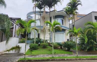 Imagem: A casa possui 5 Dormitórios, 5 Banheiros, 2 Vagas na garagem