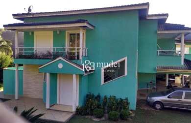 Imagem: A casa em condomínio possui 5 Dormitórios, 5 Banheiros, 4