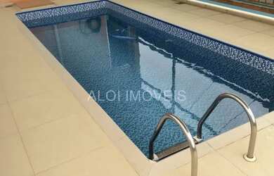 Imagem: A casa possui 3 Dormitórios, 5 Banheiros, 2 Vagas na garagem